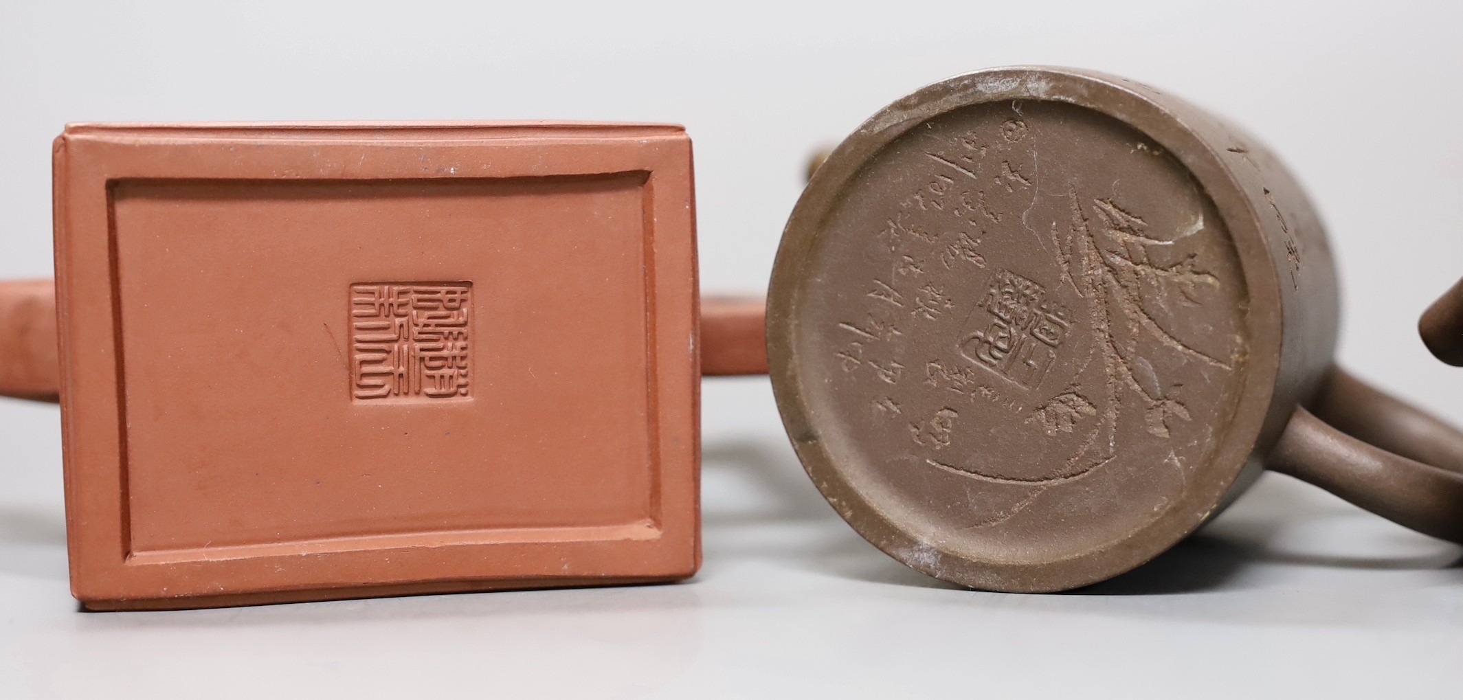 A Chinese Yixing rectangular teapot and three other Yixing teapots (4), Tallest 12 cms high